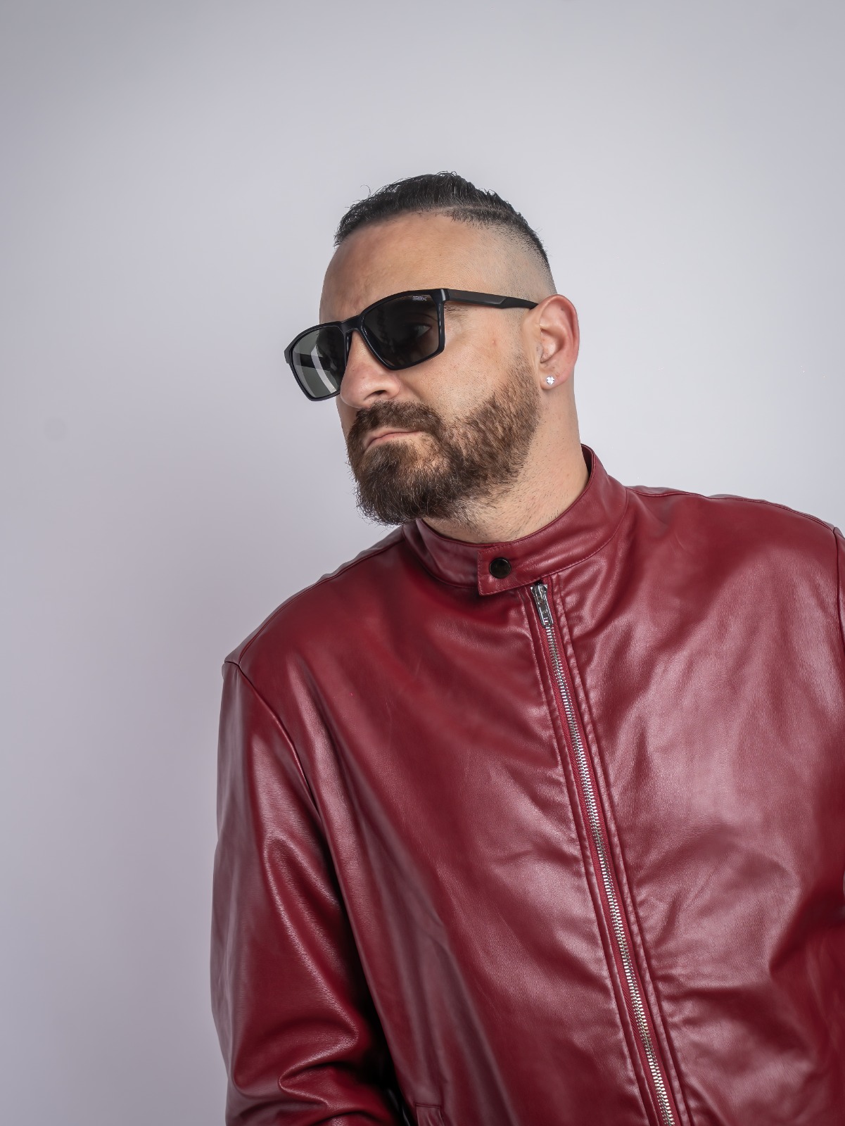 SonicJ in a red leather jacket
